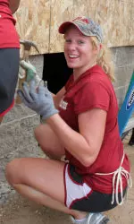 All-American Ashley Priess hammered away during the Crimson Tide's Habitat for Humanity work day.