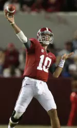 AJ McCarron was named one of 10 finalists for the Johnny Unitas Golden Arm Award on Thursday.