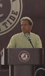 Coach Saban addresses the crowd on Thursday