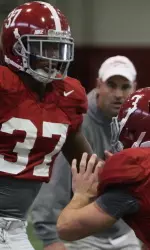 Robert Lester and Vinnie Sunseri hard at work on Thursday.