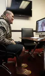 Alabama's Jesse Williams skypes with Australian Prime Minister Julia Gillard on Wednesday evening.