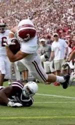 Vinnie Sunseri returning an interception for a touchdown against Texas A&M.