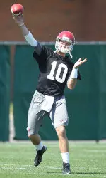 AJ McCarron began his third season as the Tide's starting quarterback with a two-hour spring practice on Saturday.