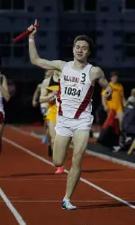 Robbie Farnham-Rose crosses the finish line as Alabama wins the 4,000-meter distance medley relay on Saturday evening at the John Mitchell Alabama Relays.