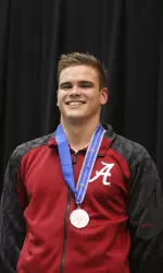 Anton McKee won the 200 breaststroke with a new SEC record.