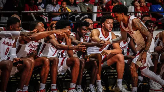 Men's Basketball Team on the sideline