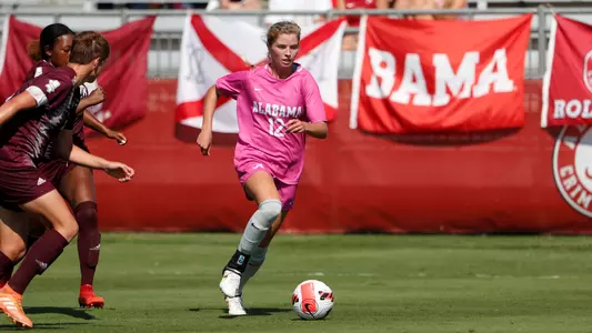 Riley Tanner Dribbles Balls