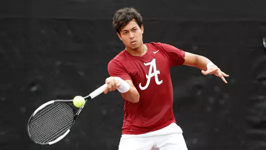 Joao Ferreira hits the ball
