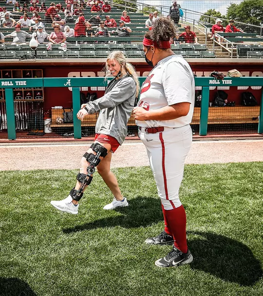 Bailey Dowling showing off her walking skills after surgery for a fellow teammate