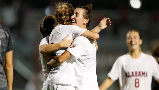 TAnner and Rogers celebrate after game winning goal