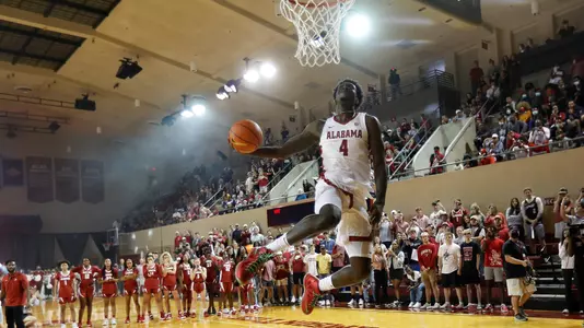 Juwan Gary dunks at Tide Tipoff