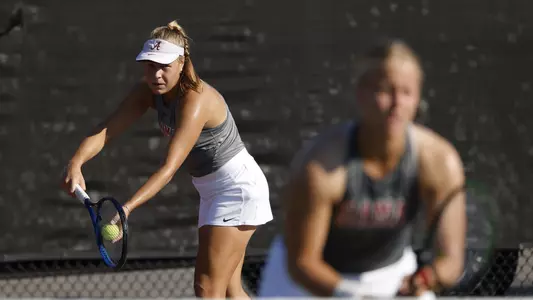 Anna Parkhomenko serves the ball