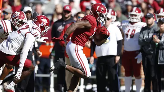 Brian Robinson Jr. carrying the ball