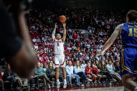 Jaden Shackelford shoots a three-point shot vs. South Dakota State