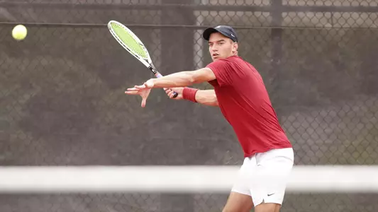 Filip Planinsek returns a ball