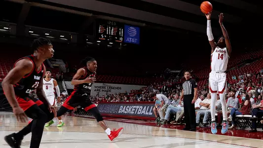 Keon Ellis Shoots three-pointer vs. Louisiana