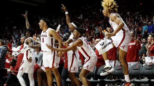Bench celebrates against Oakland