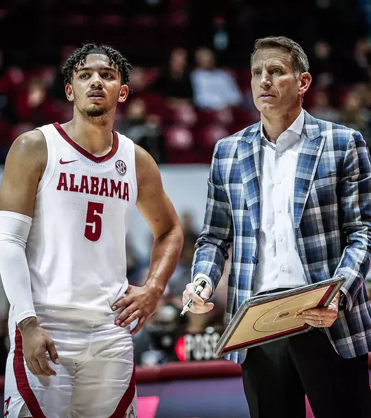 Jaden Shackelford and Nate Oats on the sideline