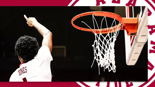 Jones cutting the net
