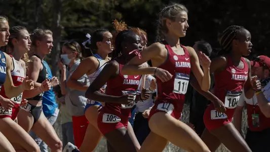 Amaris Tyynismaa, Esther Gitahi and Mercy Chelangat at the 2021 NCAA Championships