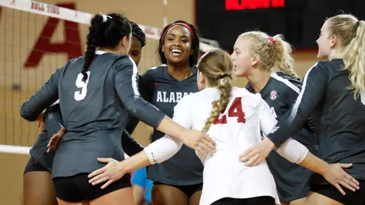 Alabama volleyball team celebrates after a point