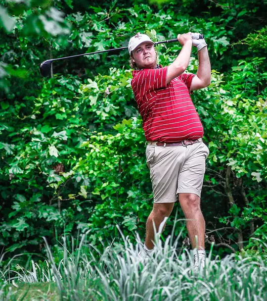 Canon Claycomb at the end of his swing
