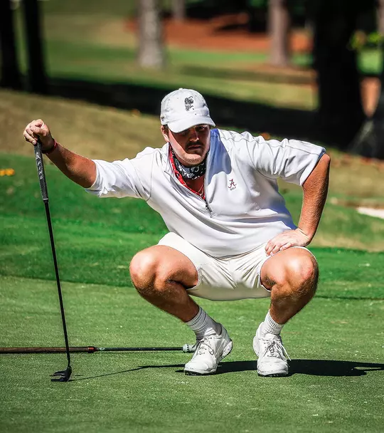 Canon Claycomb evaluating a shot