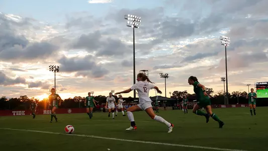 Riley Tanner chases the ball
