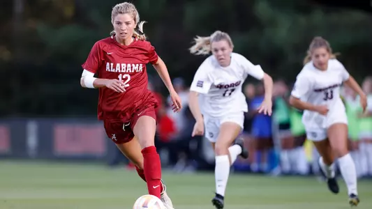 Riley Tanner dribbles the ball