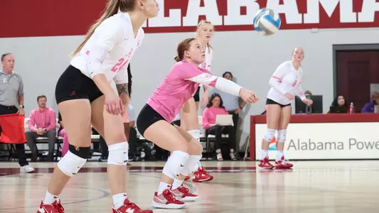 Alabama volleyball player Victoria Schmer hits the ball.