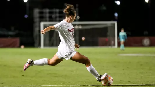 Kat Rogers kicks the ball