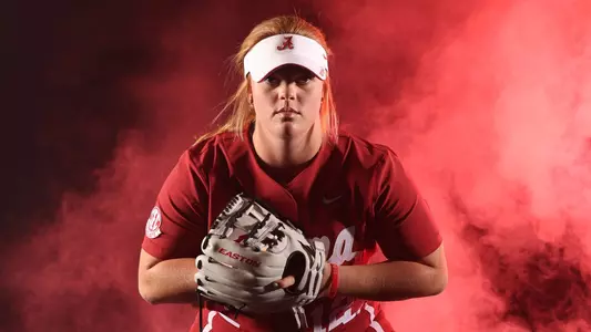 Alabama softball player Emma Broadfoot poses with pitcher's mit.