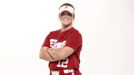 Alabama softball player Emma Broadfoot poses with her arms crossed.