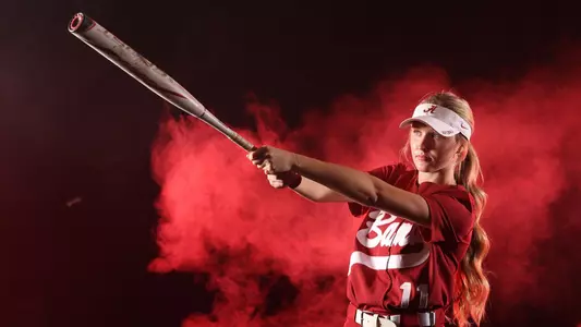 Larissa Preuitt swinging a bat