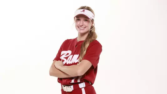 Larissa Preuitt smiling arms crossed pose