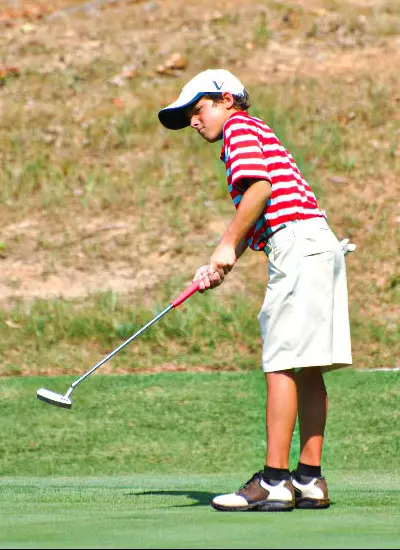 Jack Goldasich swinging the club as a child