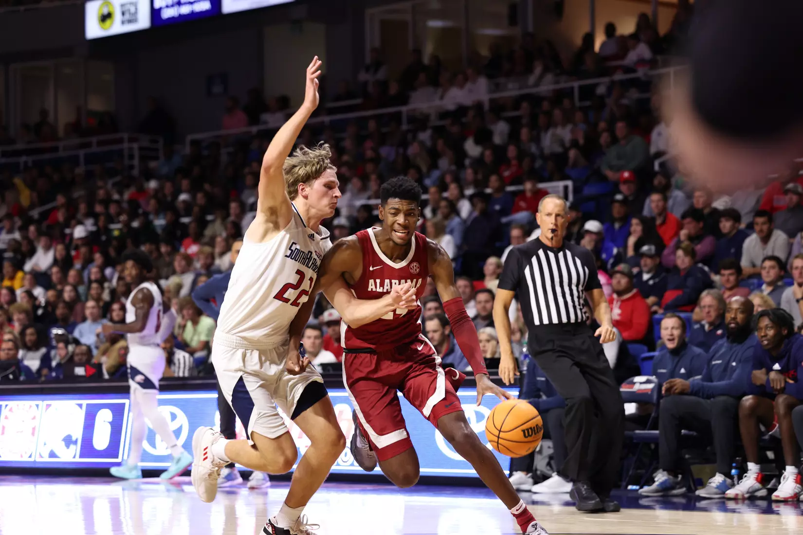 Alabama Forward Brandon Miller (24) dribbles the ball against South Alabama at Mithell Center in Mobile, AL on Tuesday, Nov 15, 2022.