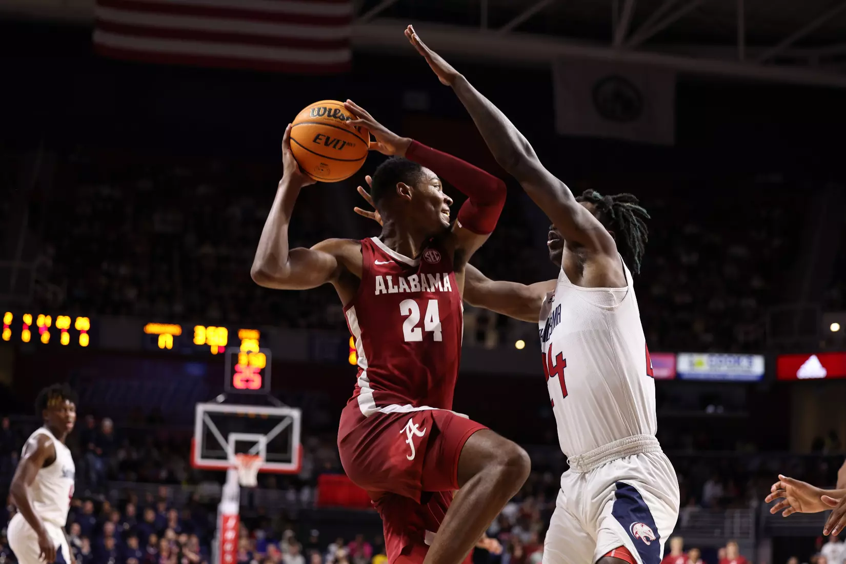 Alabama Forward Brandon Miller (24) looks to pass the ball against South Alabama at Mithell Center in Mobile, AL on Tuesday, Nov 15, 2022.