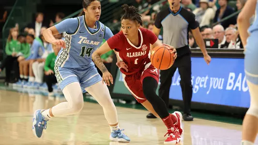 Meg Abrams dribbles the ball