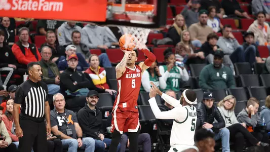 mensbasketball-action-JahvonQuinerly20221124