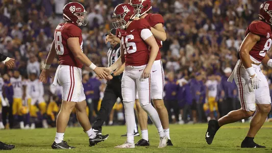 Alabama snapper Kneeland Hibbett (48), PK Will Reichard (16) and punter James Burnip (86) celebrate against LSU at Tiger Stadium in Baton Rouge, LA on Saturday, Nov 5, 2022.