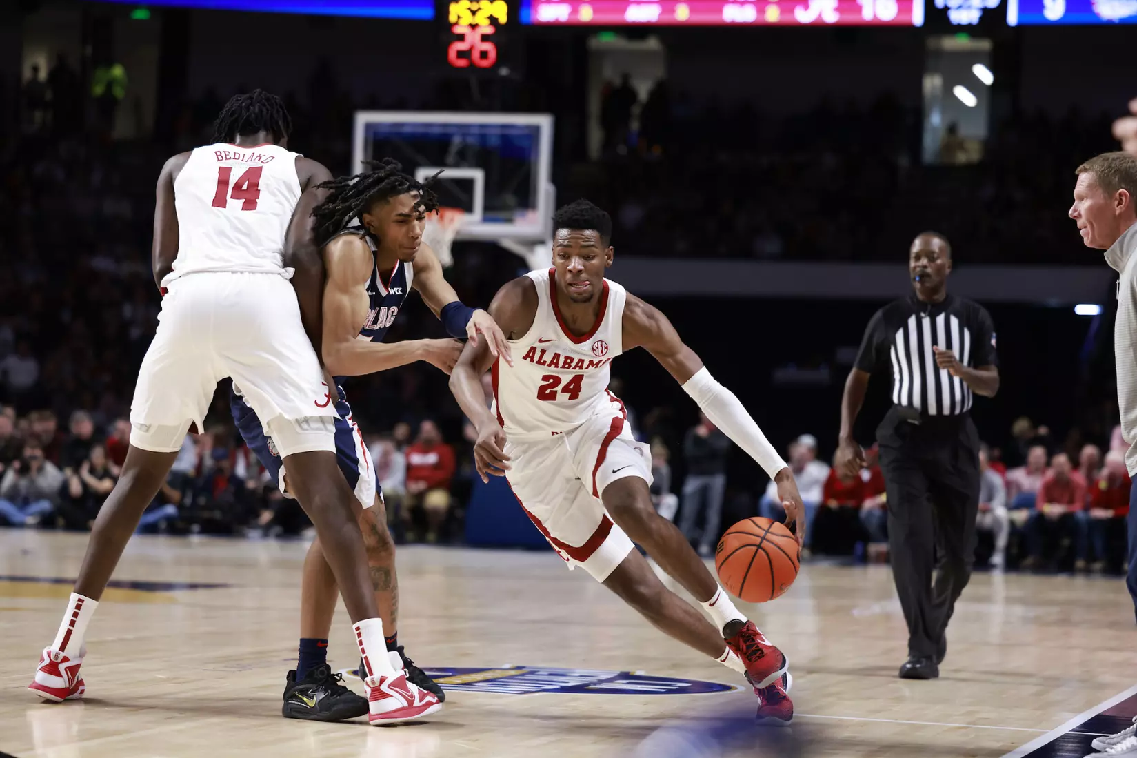 Alabama Forward Brandon Miller (24) dribbles the ball against Gonzaga at Legacy Arena in Birmingham, AL on Saturday, Dec 17, 2022.