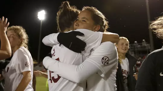Kat Rogers hugging Tanna Sanchez-Carreto