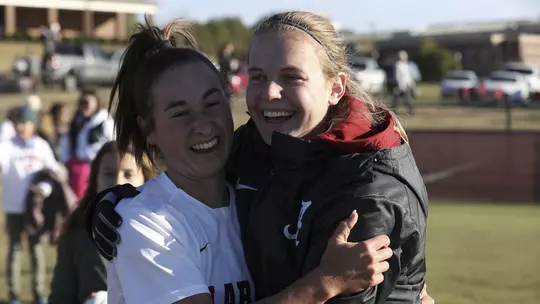 Kat Rogers and Emelie Kobler hugging each other