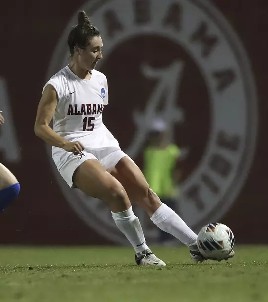 Kat Rogers shooting the ball