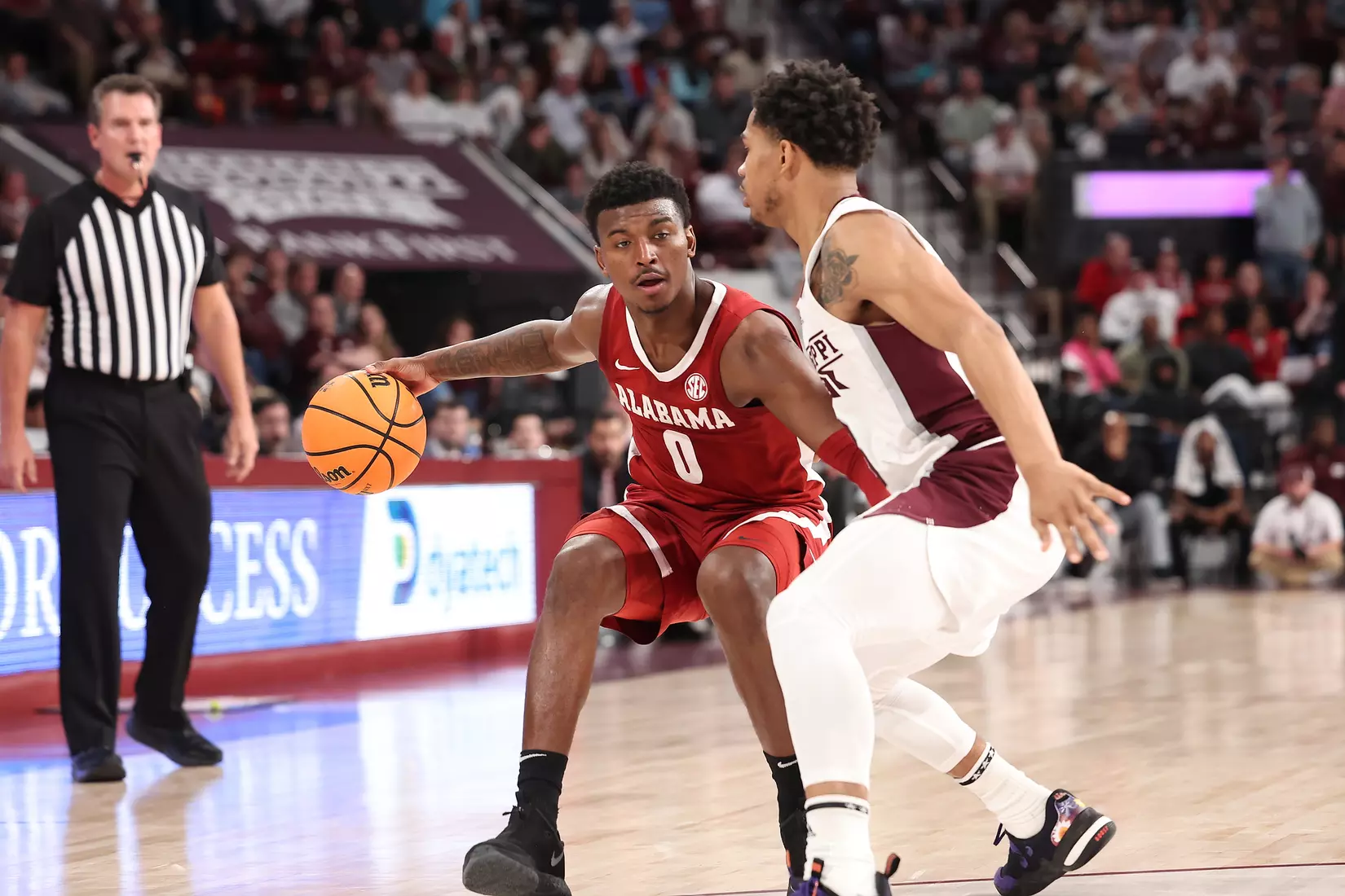 Alabama Guard Jaden Bradley (0) dribbles the ball against Mississippi State at Humphrey Coliseum in Starkville, MS on Wednesday, Dec 28, 2022.