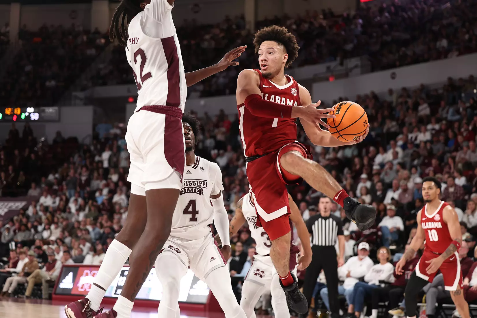 Alabama Forward Darius Miles (2) passes the ball against Mississippi State at Humphrey Coliseum in Starkville, MS on Wednesday, Dec 28, 2022.
