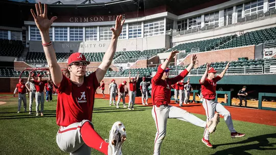 Baseball Team stretching out on the field