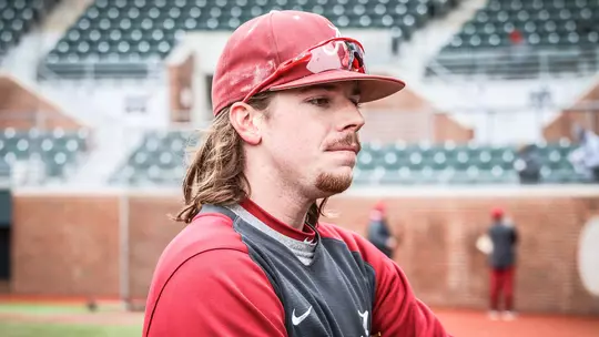 Brock Guffey standing on the field in workout gear