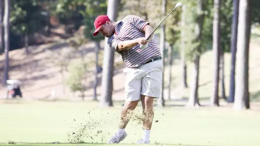 Canon Claycomb tees off